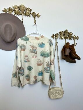 Cream Bunny Print Cozy Crewneck Sweater front sequin ptp 22” l 23”